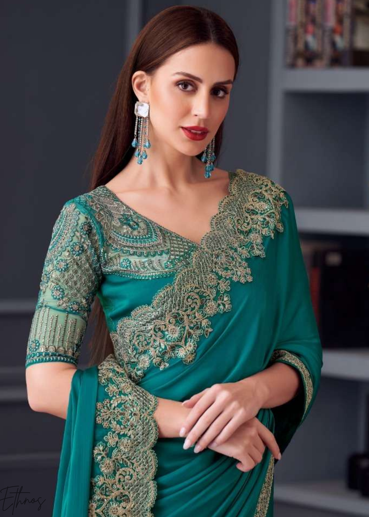 Teal Blue Heavy Border Embroidered Opium Silk Chiffon Saree