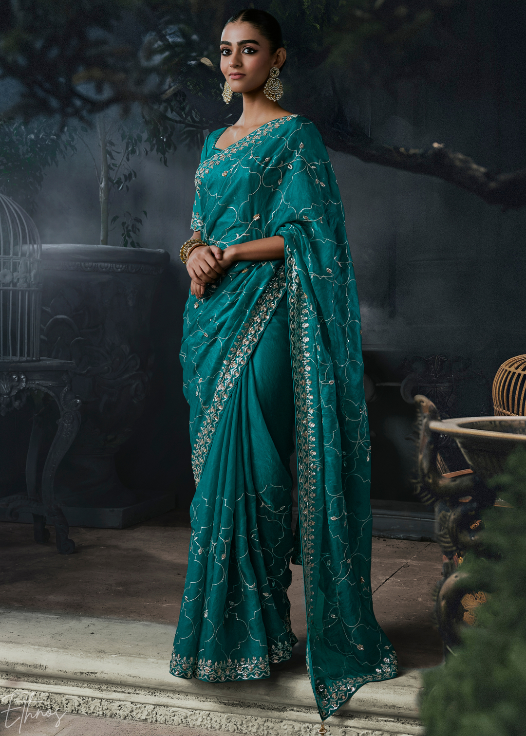 Teal Blue Intricate Border Organza Silk Saree