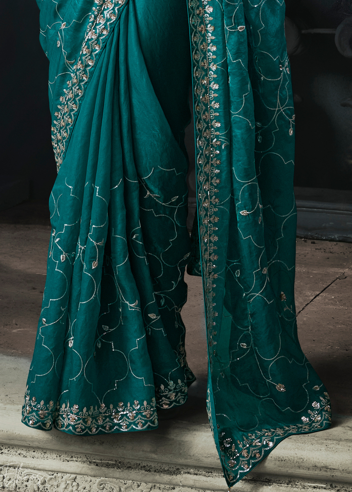Teal Blue Intricate Border Organza Silk Saree
