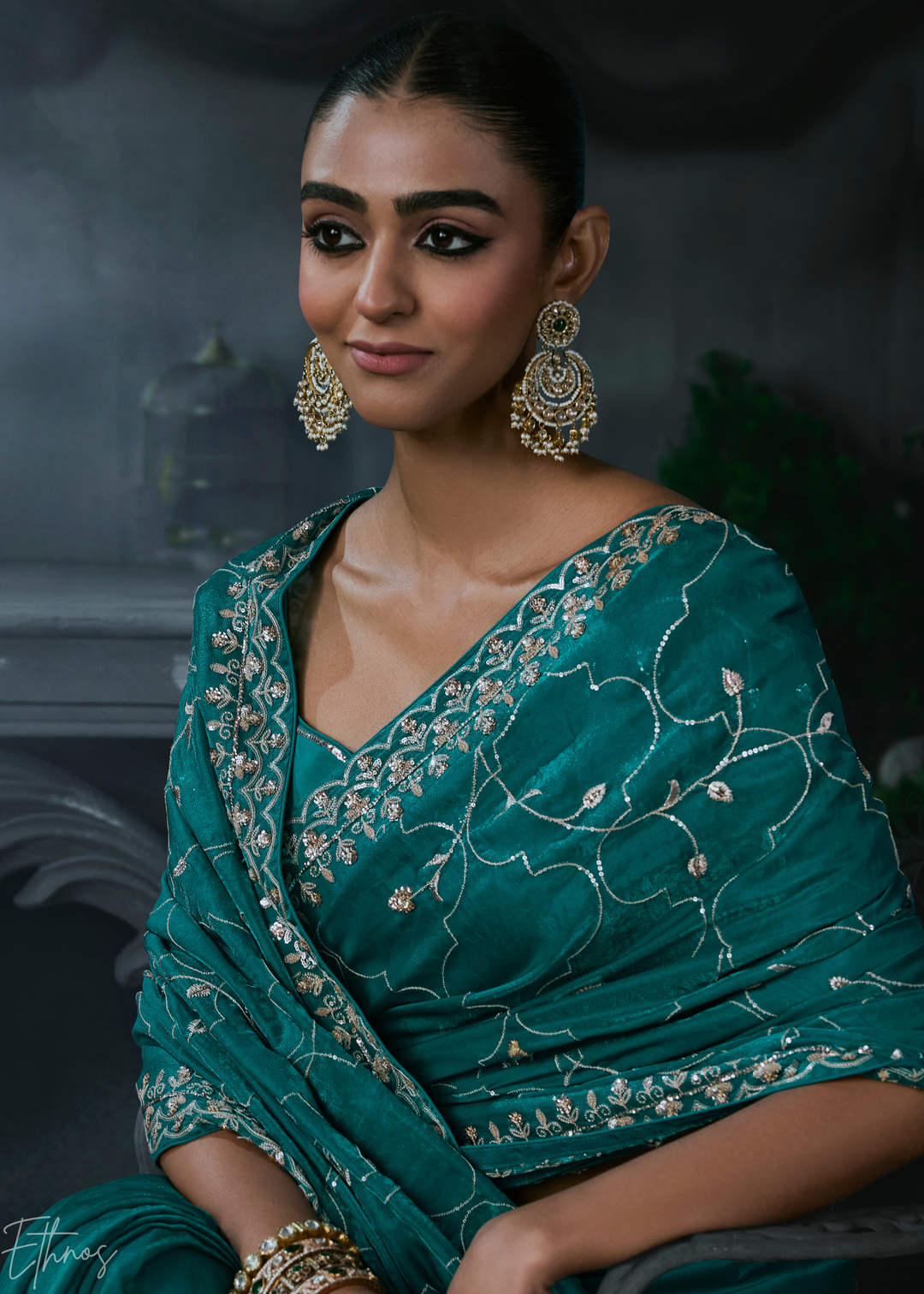 Teal Blue Intricate Border Organza Silk Saree