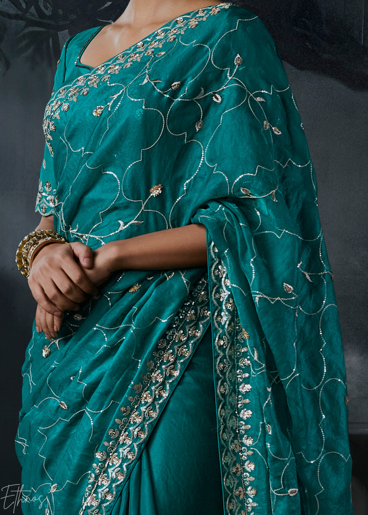 Teal Blue Intricate Border Organza Silk Saree
