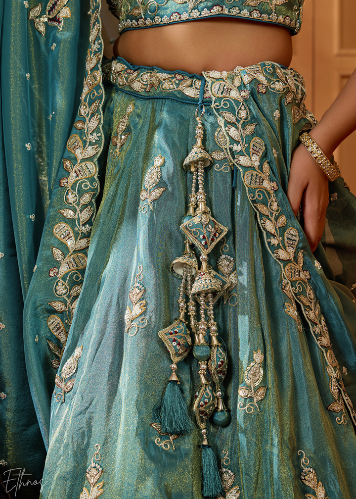 Teal Green Floral Zari Embroidered Tissue Lehenga Choli