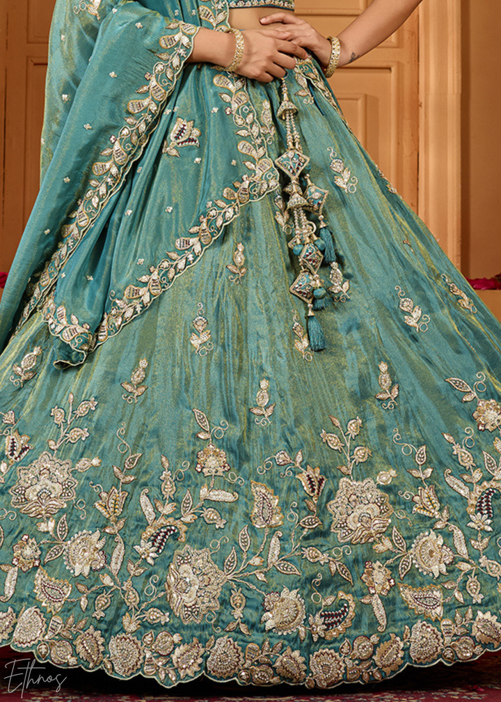 Teal Green Floral Zari Embroidered Tissue Lehenga Choli