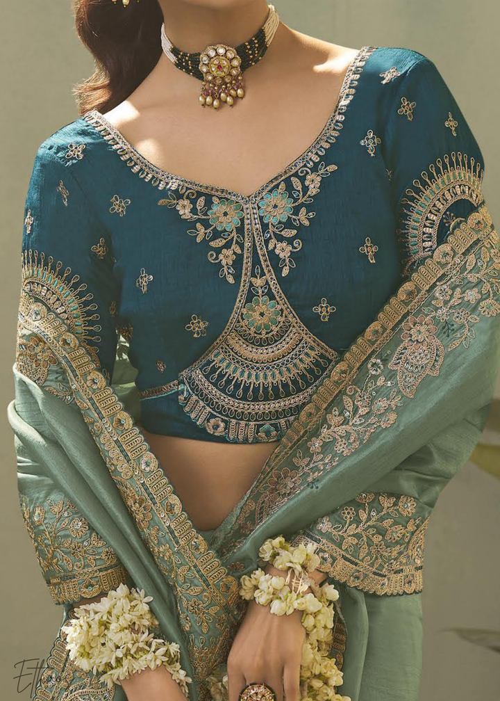 Teel Green Woven Scallop Border Upada Silk Saree