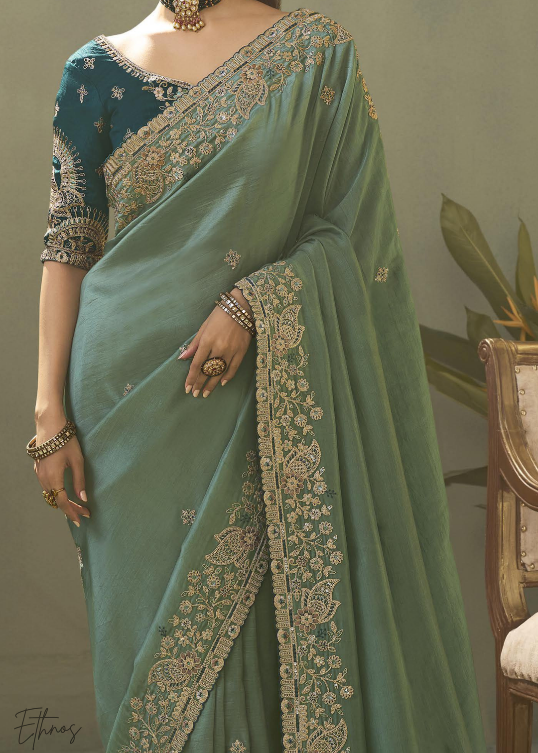 Teel Green Woven Scallop Border Upada Silk Saree