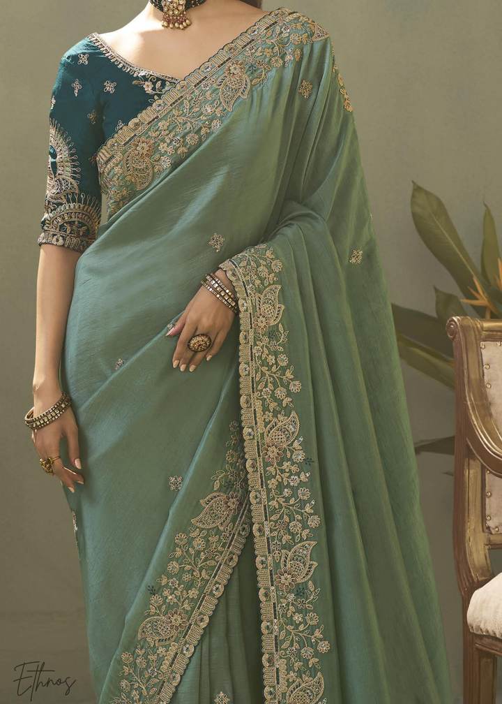 Teel Green Woven Scallop Border Upada Silk Saree