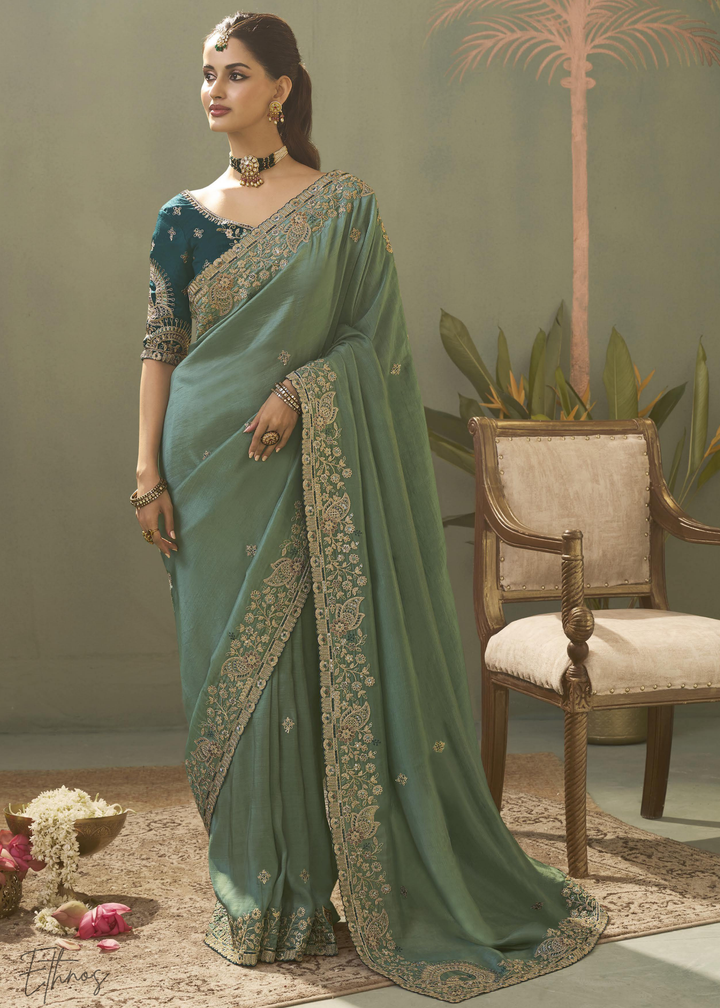 Teel Green Woven Scallop Border Upada Silk Saree