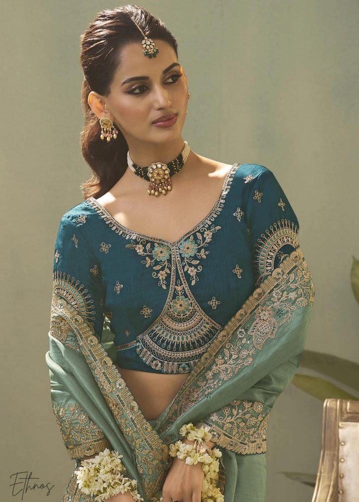 Teel Green Woven Scallop Border Upada Silk Saree