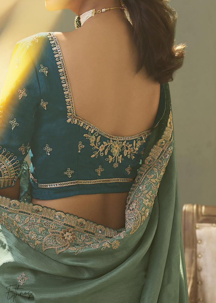 Teel Green Woven Scallop Border Upada Silk Saree