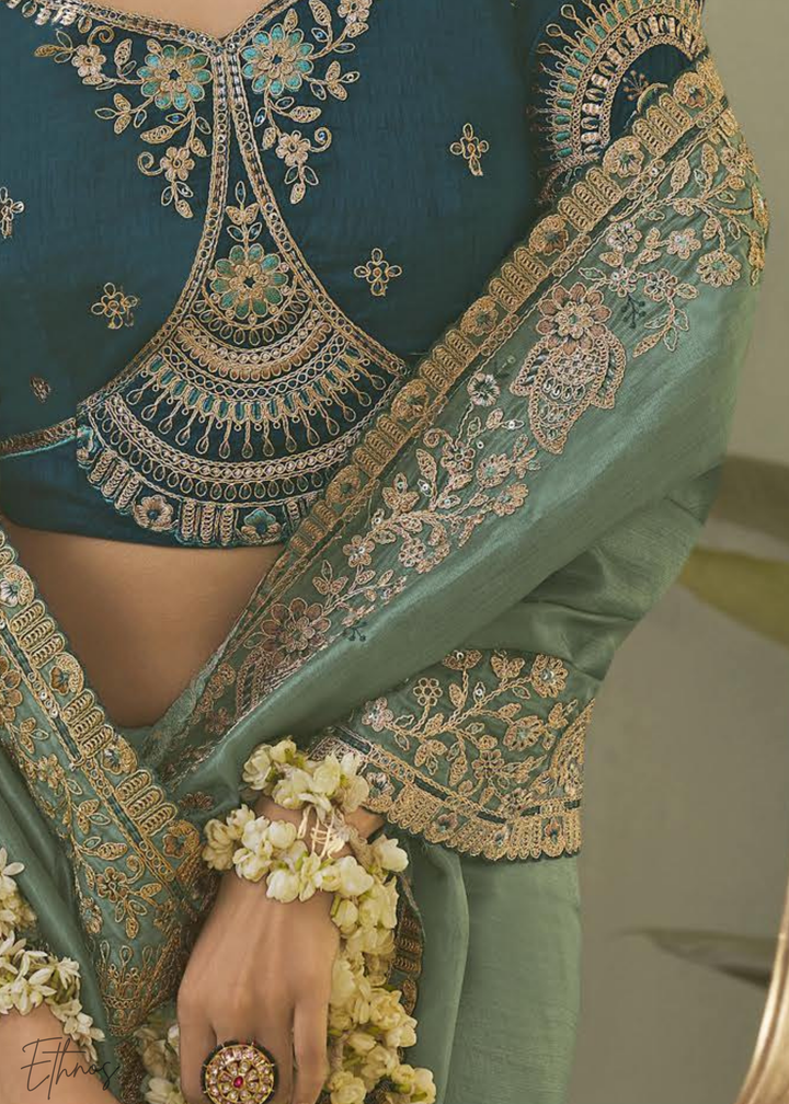 Teel Green Woven Scallop Border Upada Silk Saree