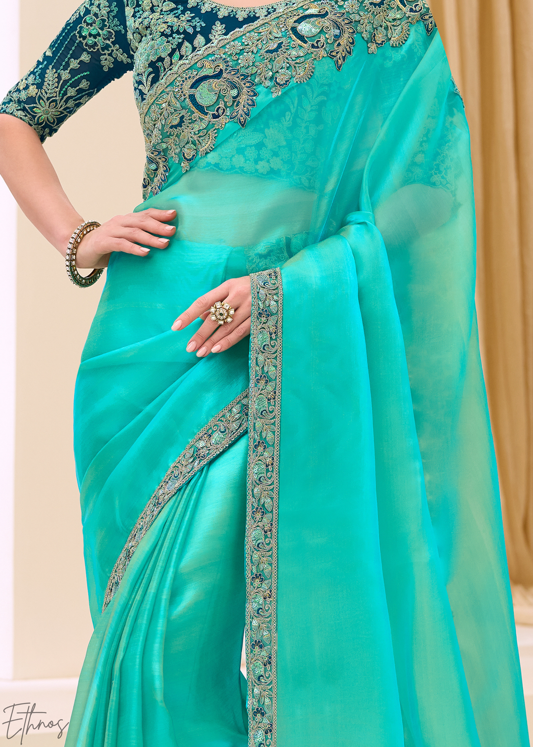 Turquoise Aqua Luminous Tissue Georgette Saree