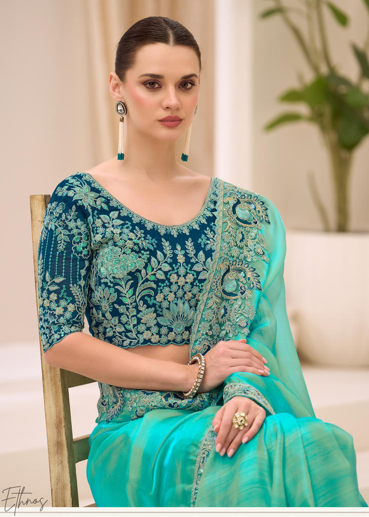 Turquoise Aqua Luminous Tissue Georgette Saree