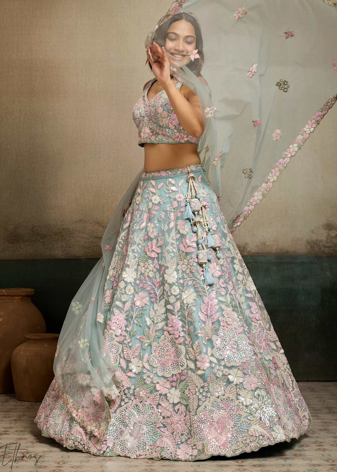 Turquoise Pastel Floral Embroidered Net Lehenga