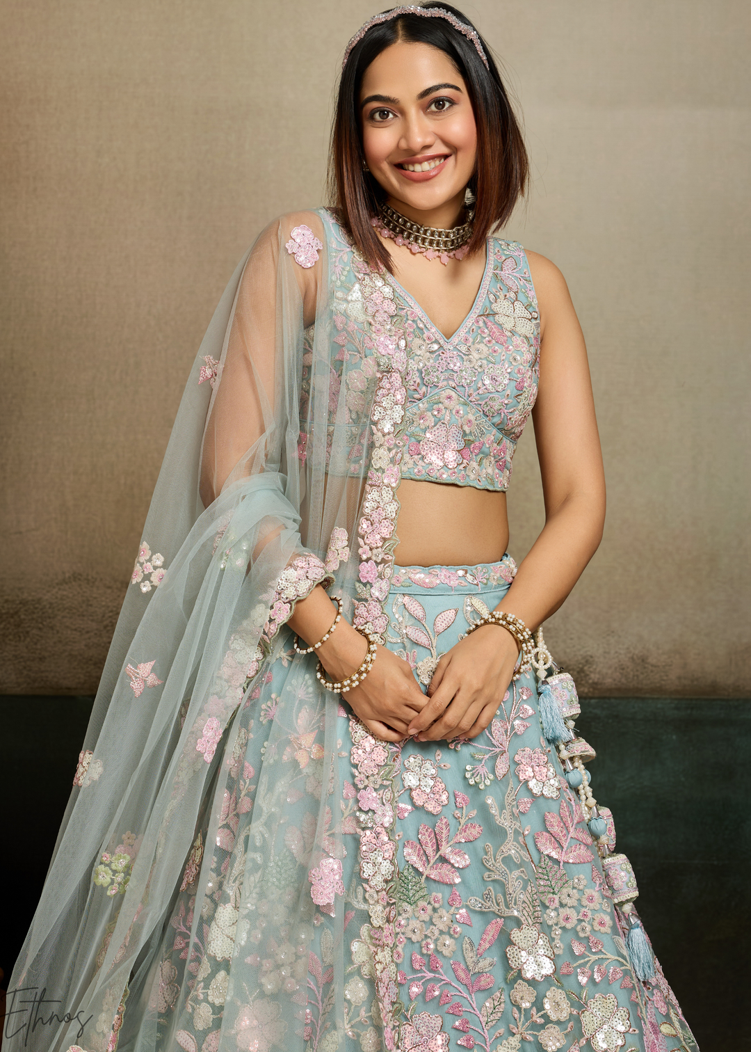 Turquoise Pastel Floral Embroidered Net Lehenga