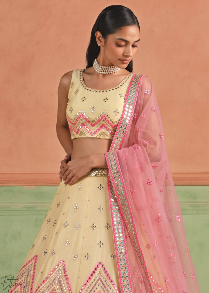 Muted Yellow Chevron Mirror Embellished Organza Lehenga Choli