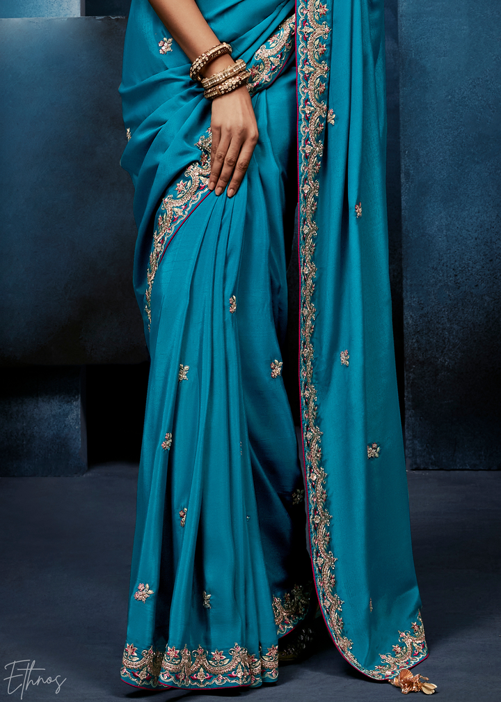 Vibrant Teal Tambour Embroidered Border Tissue Saree