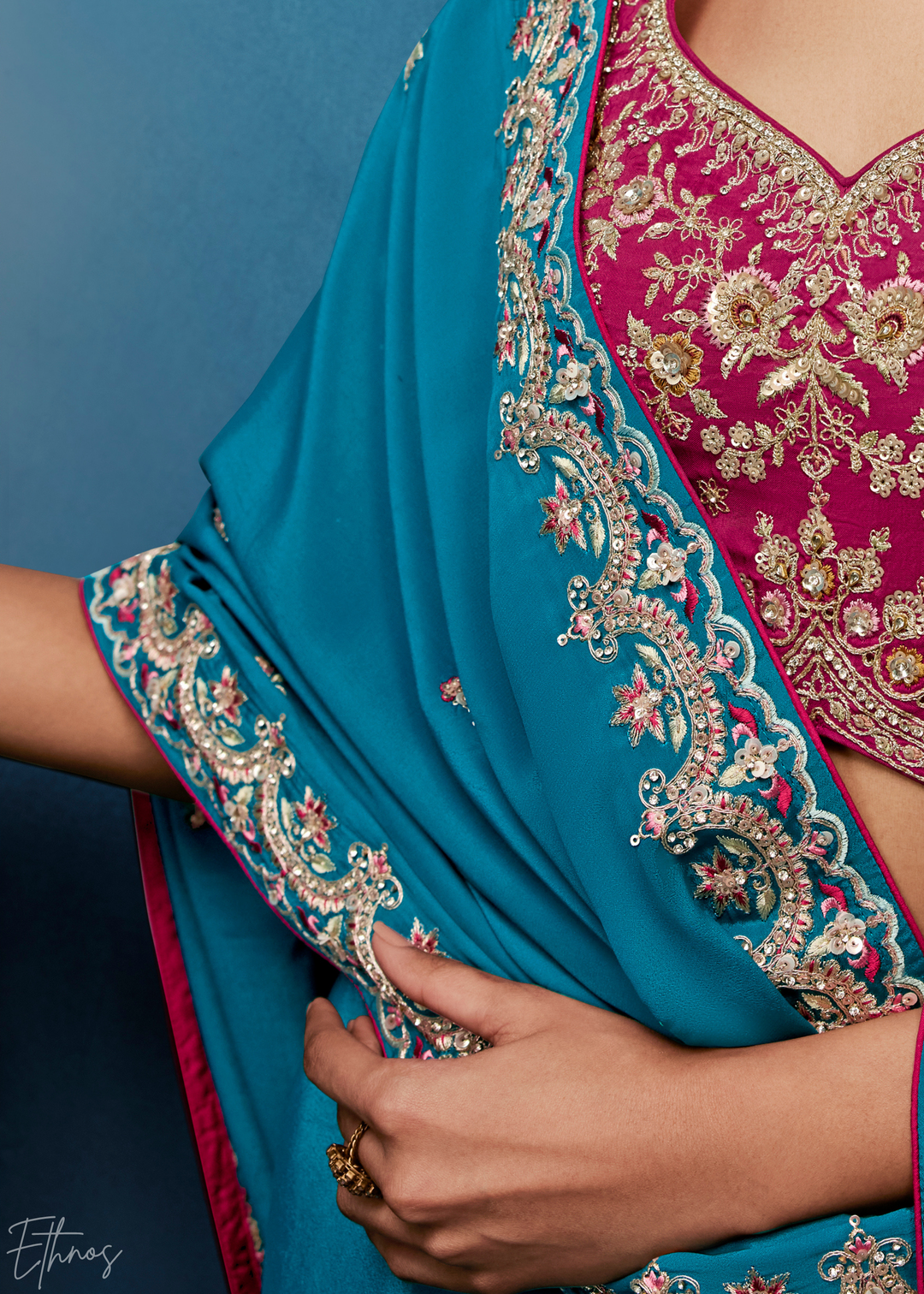 Vibrant Teal Tambour Embroidered Border Tissue Saree