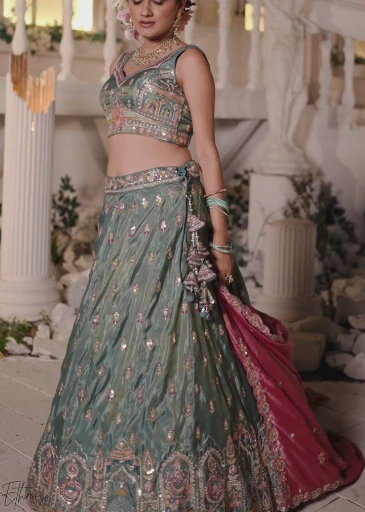 Sea Green and Pink Peacock Embroidered Tissue Lehenga Choli