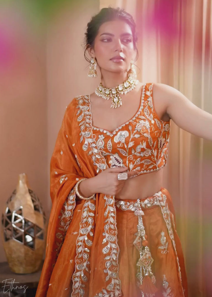 Tangerine Orange Floral Zari Embroidered Tissue Lehenga Choli