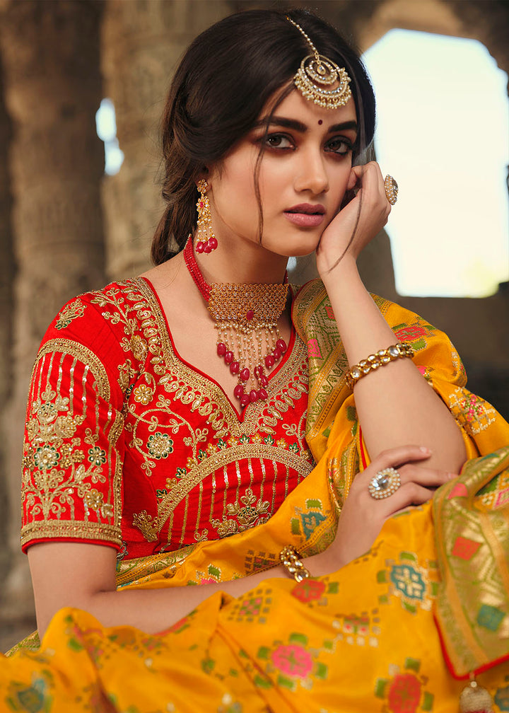 Saffron Yellow Woven Banarasi Silk Saree with Embroidered Blouse