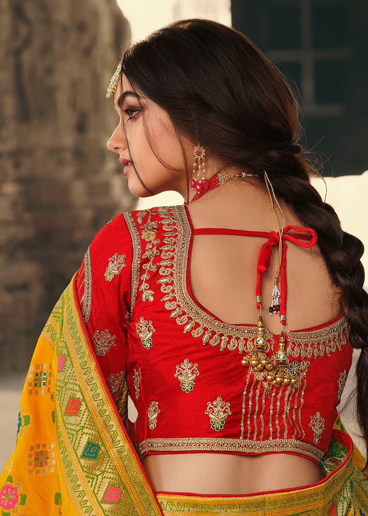 Saffron Yellow Woven Banarasi Silk Saree with Embroidered Blouse