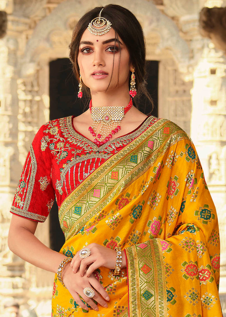 Saffron Yellow Woven Banarasi Silk Saree with Embroidered Blouse