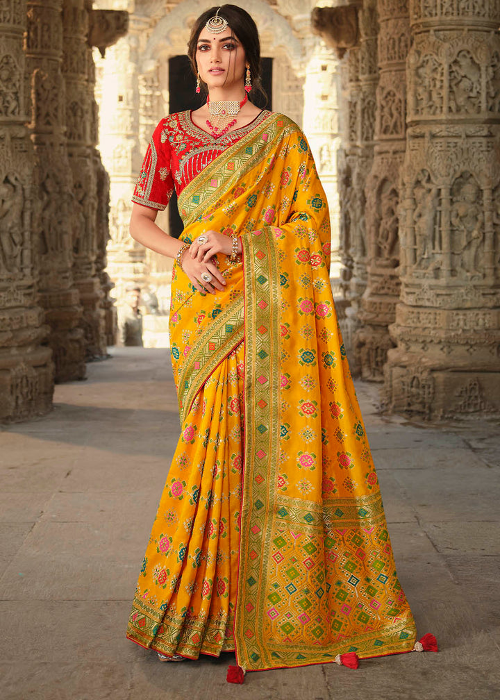 Saffron Yellow Woven Banarasi Silk Saree with Embroidered Blouse