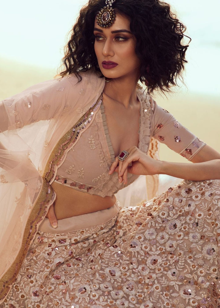 Salmon Pink Soft Net Designer Lehenga Choli with overall Sequins and Thread work