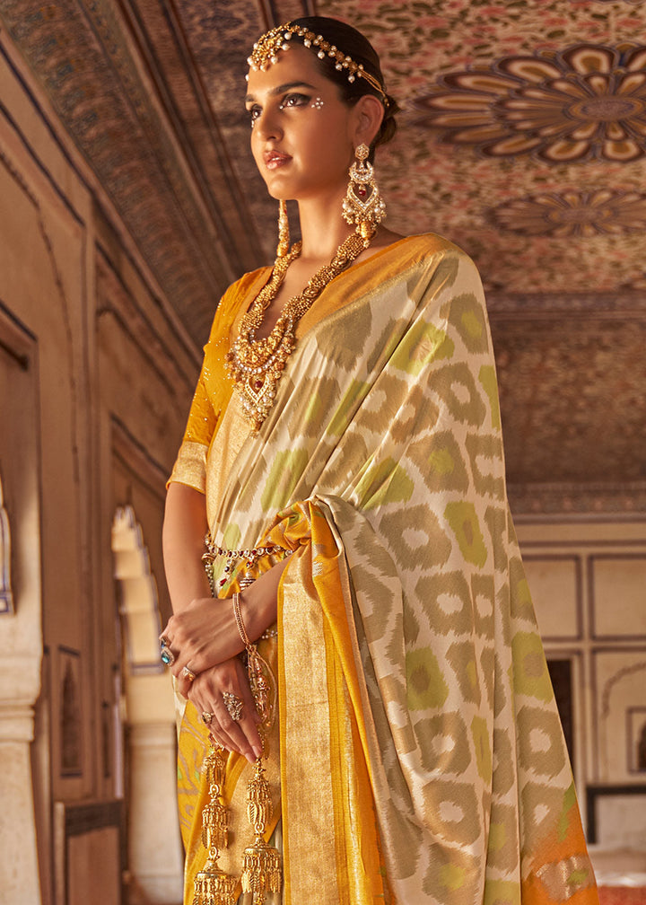 Cream & Yellow Printed Patola Dola Silk Saree with Zari Border