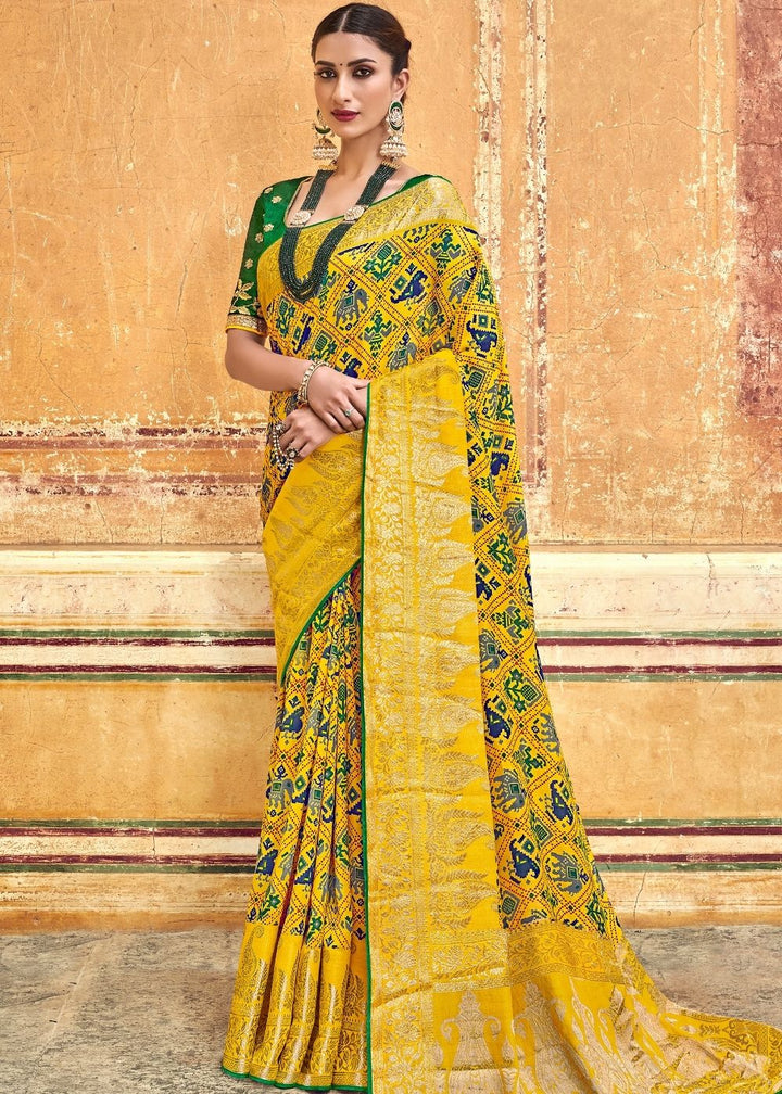 Yellow Patola Printed Silk Saree with Heavy Embroidery Border