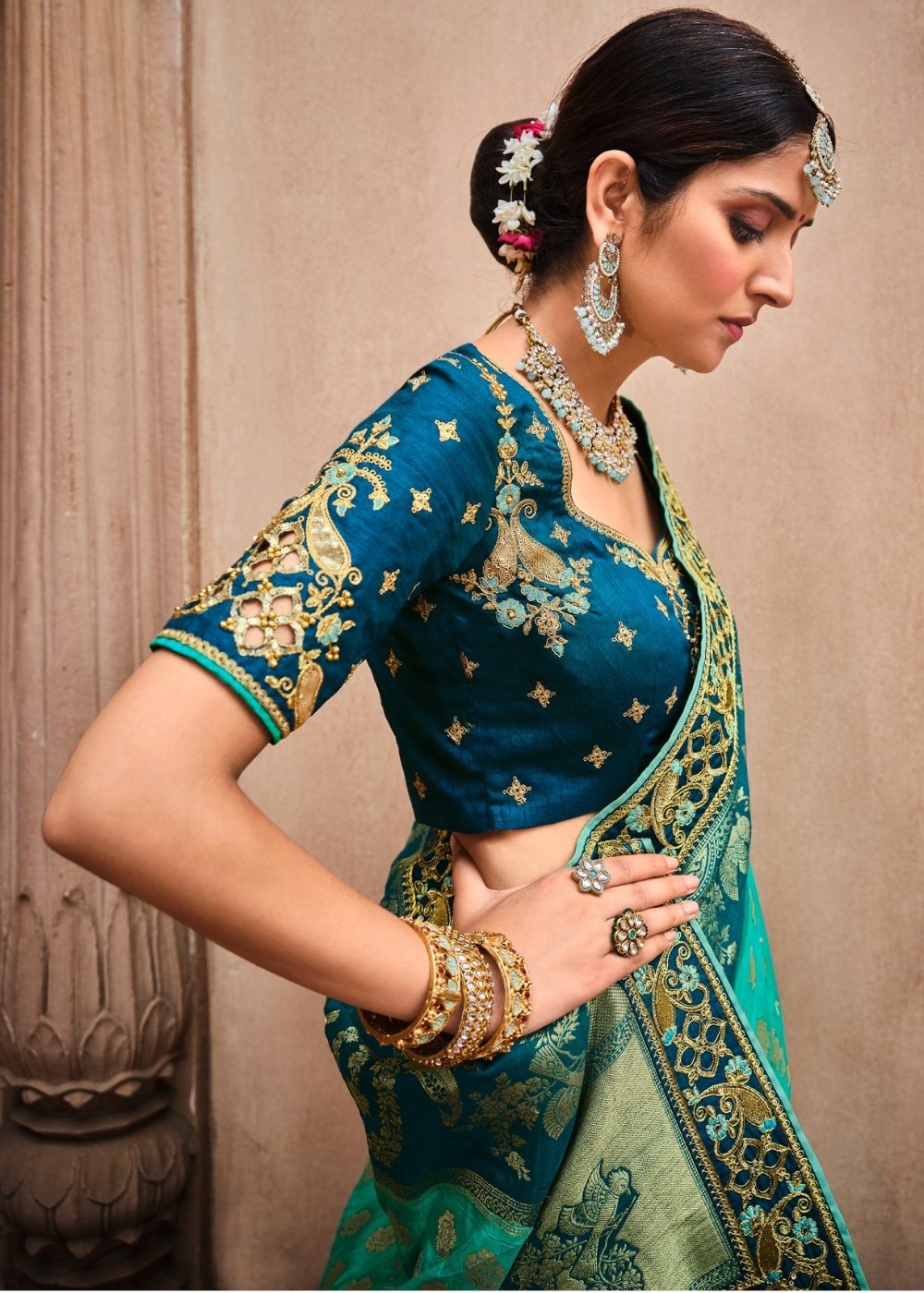 Turquoise Blue Jacquard Woven Silk Saree with Embroidered work